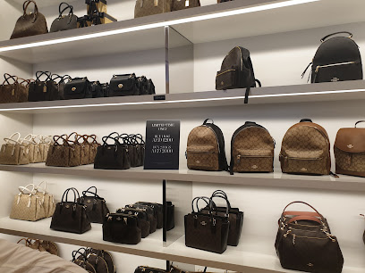 Coach Outlet - Ajman - +971 4 552 0935