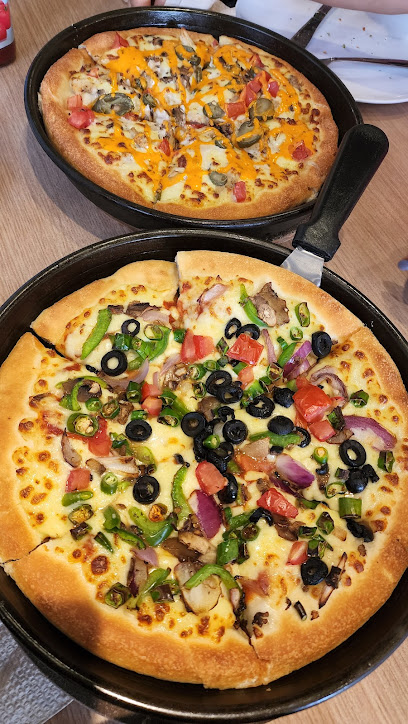 Pizza Hut - United Arab Emirates|Al Danah - Zone 1 - Abu Dhabi|Hamdan Bin Mohammed St|Beside Barclays Bank