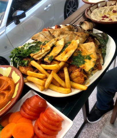 Qasr Al Dayaa Restaurant & Grill - Dubai - +971 6 555 4445