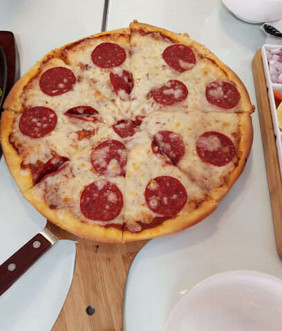 Pizza & Pizza (El Batangueno) - Sharjah - +971 6 577 3443