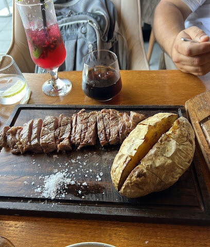 Grill House - Sharjah - +971 2 667 7767