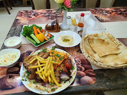 Al Ghawas Restaurant and Kitchen - Sharjah - +971 6 749 2700