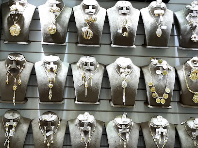 GOLD CENTER - Sharjah - +971 2 633 3311