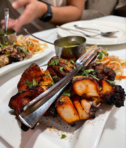 مطعم نليس الرويس Nells Restaurant Ruwais - Sharjah - +971 2 628 0044