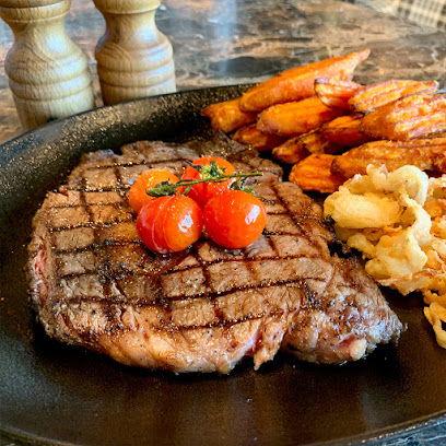 Hurricane’s Grill Dubai Mall - Sharjah - +971 4 283 1339