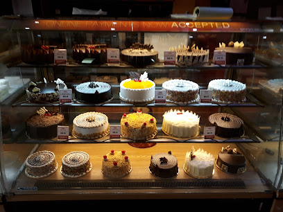 Ginny's Cake Shop And Bakery, Karama - Abu Dhabi - +971 4 334 8637