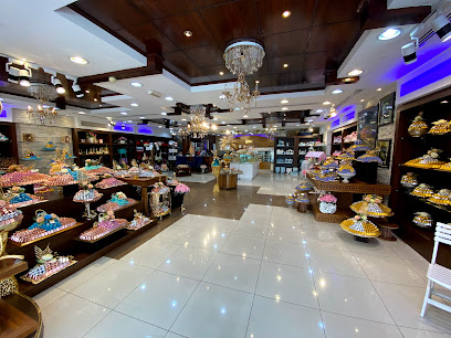 Dandy Chocola - Abu Dhabi - +971 4 255 6000