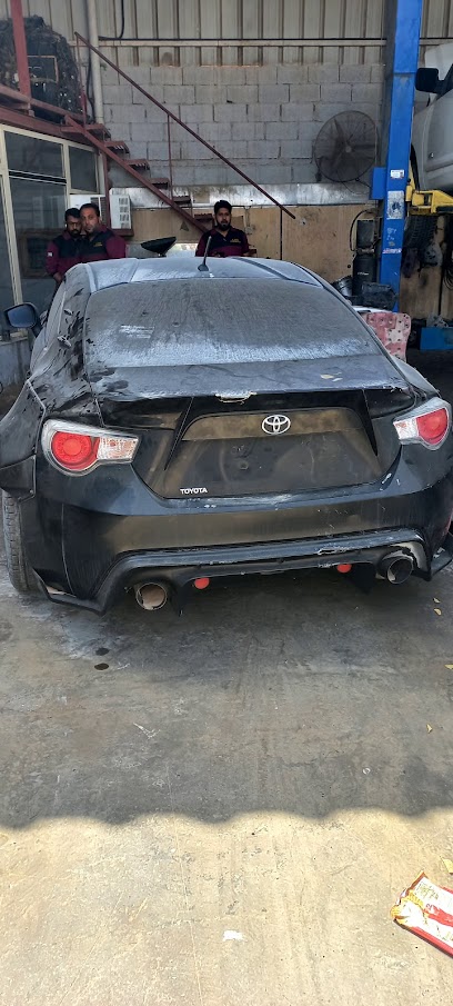 al kowaid auto maint