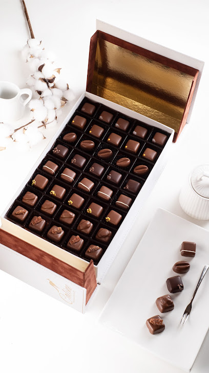 Caline Chocolate Boutique & Cafe - United Arab Emirates|Jumeirah - Jumeirah 1 - Dubai|55A St|Villa 140
