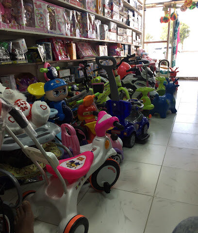 Mouna Readymade Shop - Abu Dhabi - +971 3 782 1058