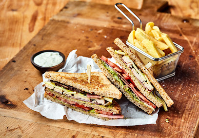 The Huddle Sports Bar & Grill - Bur Dubai - Abu Dhabi - +971 50 100 7065