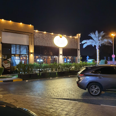 Wok & Curry Restaurant - Abu Dhabi - +971 6 555 0250