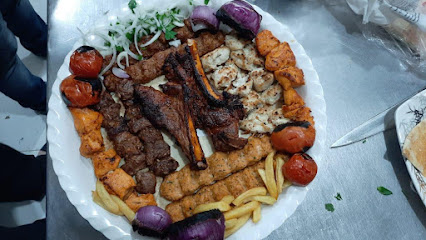مطعم أريان الأفغاني للرز البخاري -  - +971 9 234 8099