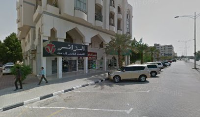الزائر للأقمشه والملابس الجاهزة - Abu Dhabi -