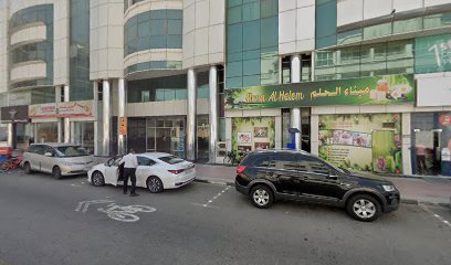 Al Razouki Exchange Management Office - Abu Dhabi - +971 4 388 5803